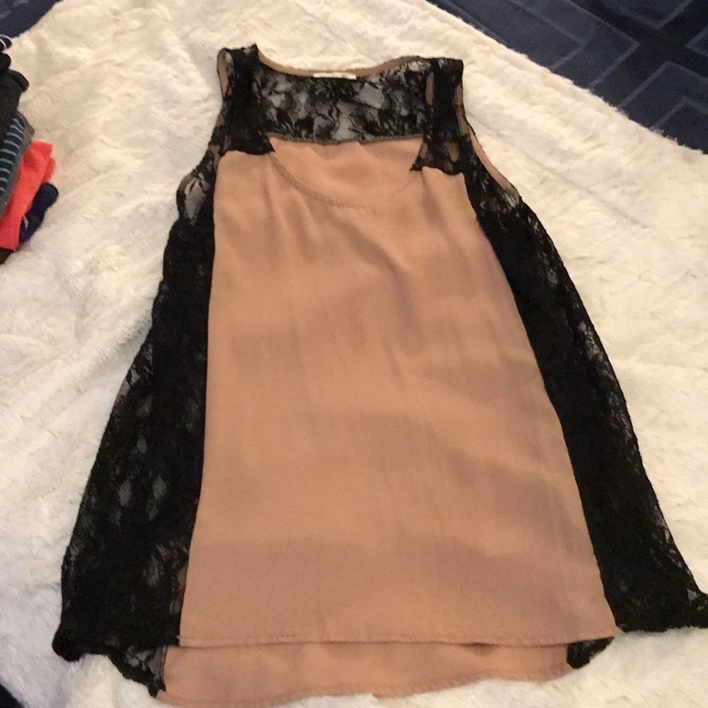 Cute tan and black tank top